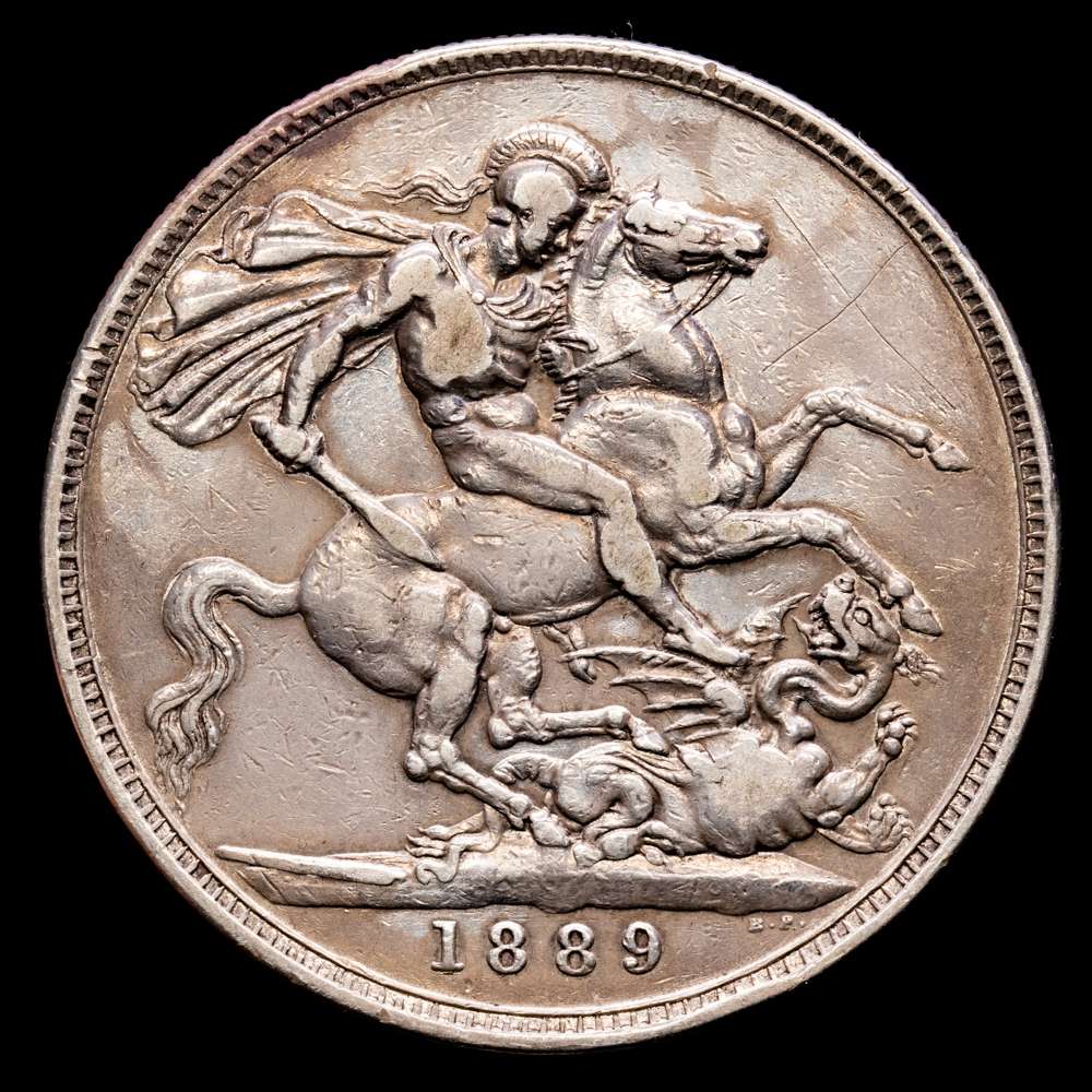 Gran Bretaña – Victoria. 1 Crown. (28,01 g.). 1889. KM-765. MBC. Golpe en canto. Pequeñas marcas.